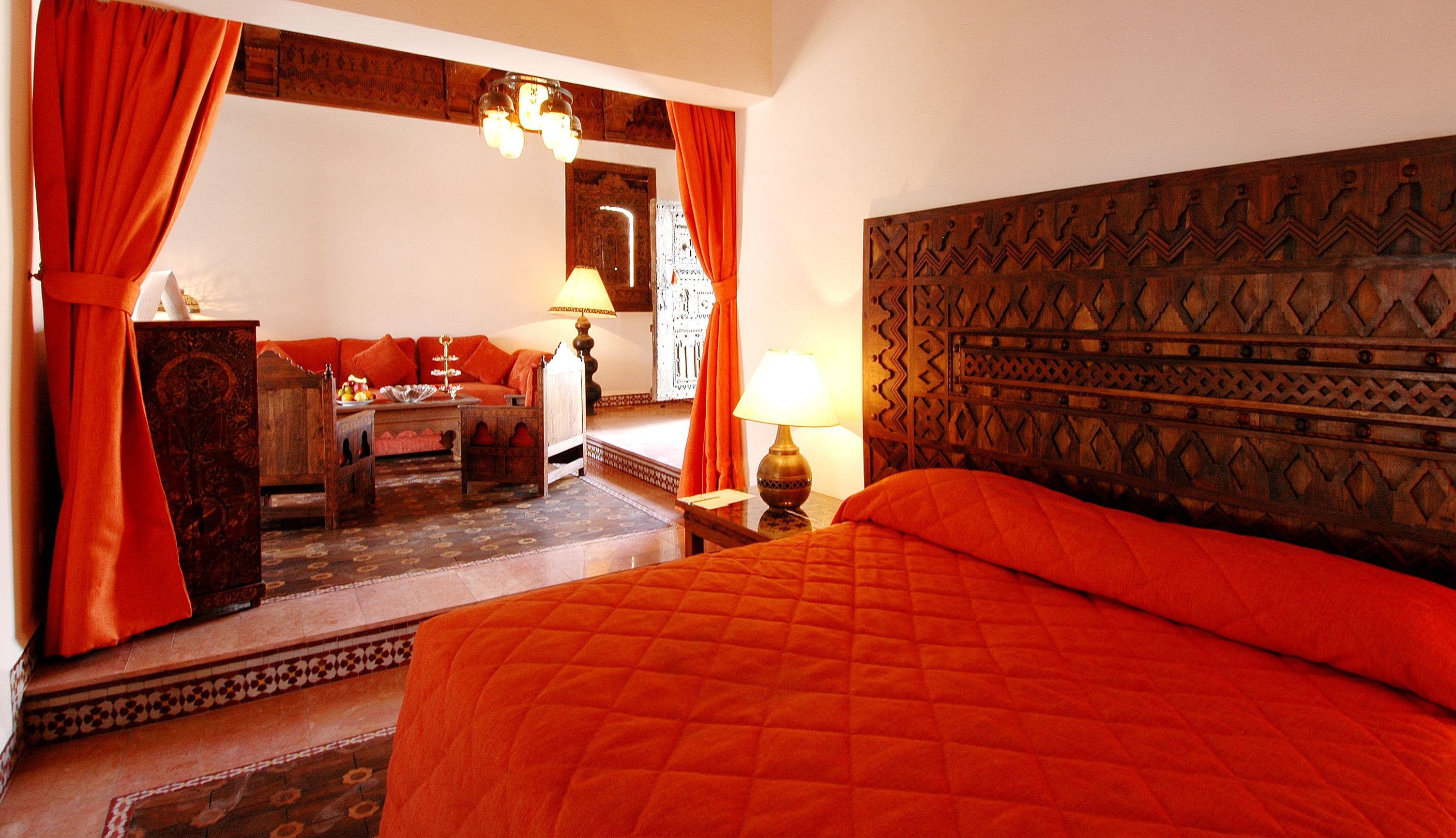 Carved wooden hotel room with warm lighting